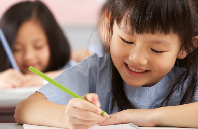 Young child learning handwriting