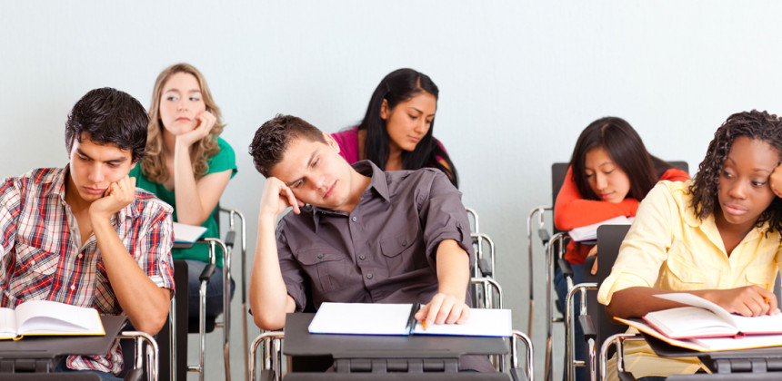 Teenagers falling asleep in class