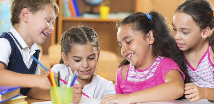 small children reading together in class