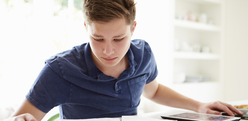 Boy studying and memorizing school work