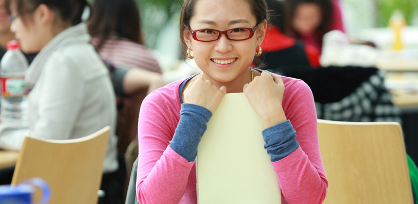 young student sitting in her chair